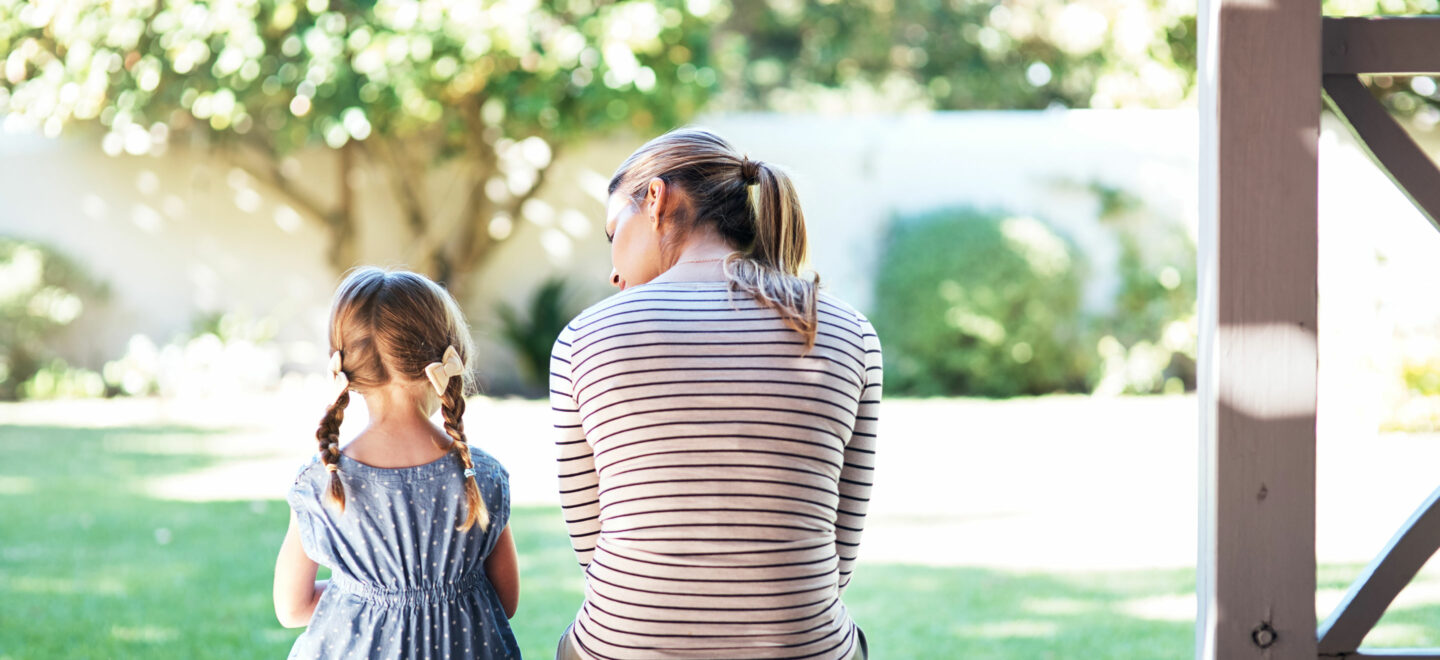 mother talking with daughter