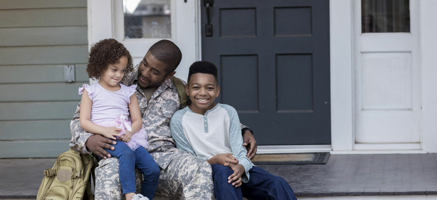 military father with two children